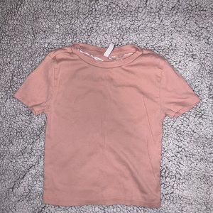 pink tight fitting crop top